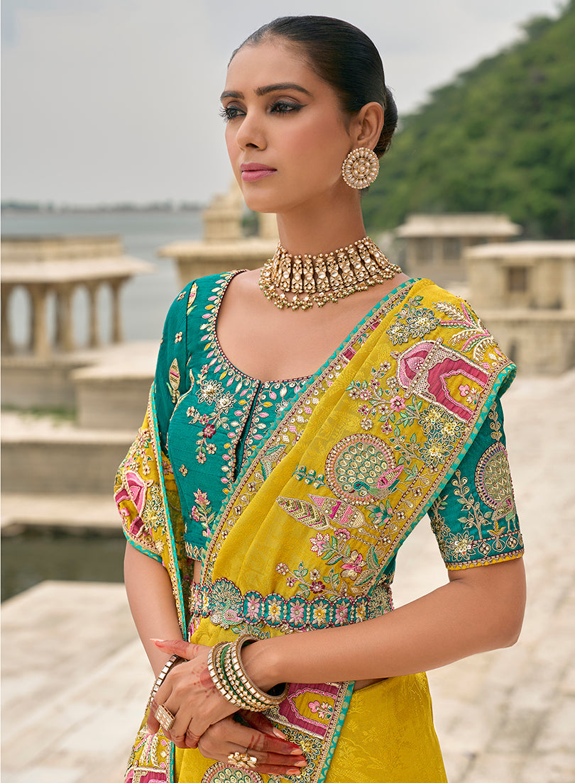 Monjolika Fashion Yellow Color Banarasi Silk Blend Embroidered With Heavy Patchwork Border Saree With Contrast Blouse