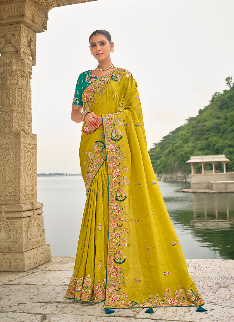 Monjolika Fashion Pear Color Banarasi Silk Blend Sequin Embroidered With Heavy Patchwork Border Saree