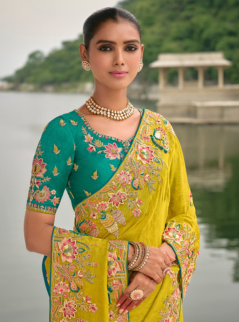 Monjolika Fashion Pear Color Banarasi Silk Blend Sequin Embroidered With Heavy Patchwork Border Saree