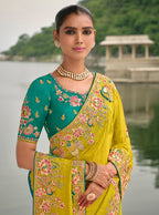 Monjolika Fashion Pear Color Banarasi Silk Blend Sequin Embroidered With Heavy Patchwork Border Saree