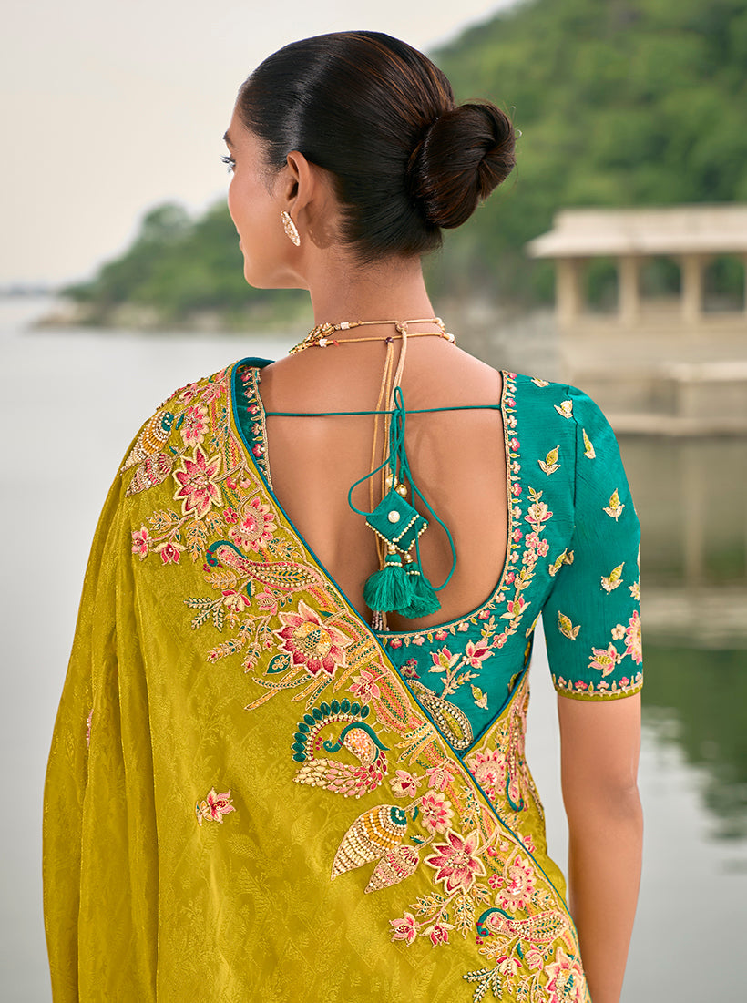Monjolika Fashion Pear Color Banarasi Silk Blend Sequin Embroidered With Heavy Patchwork Border Saree