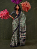 Monjolika Fashion Green Satin Crepe Printed Contemporary Saree