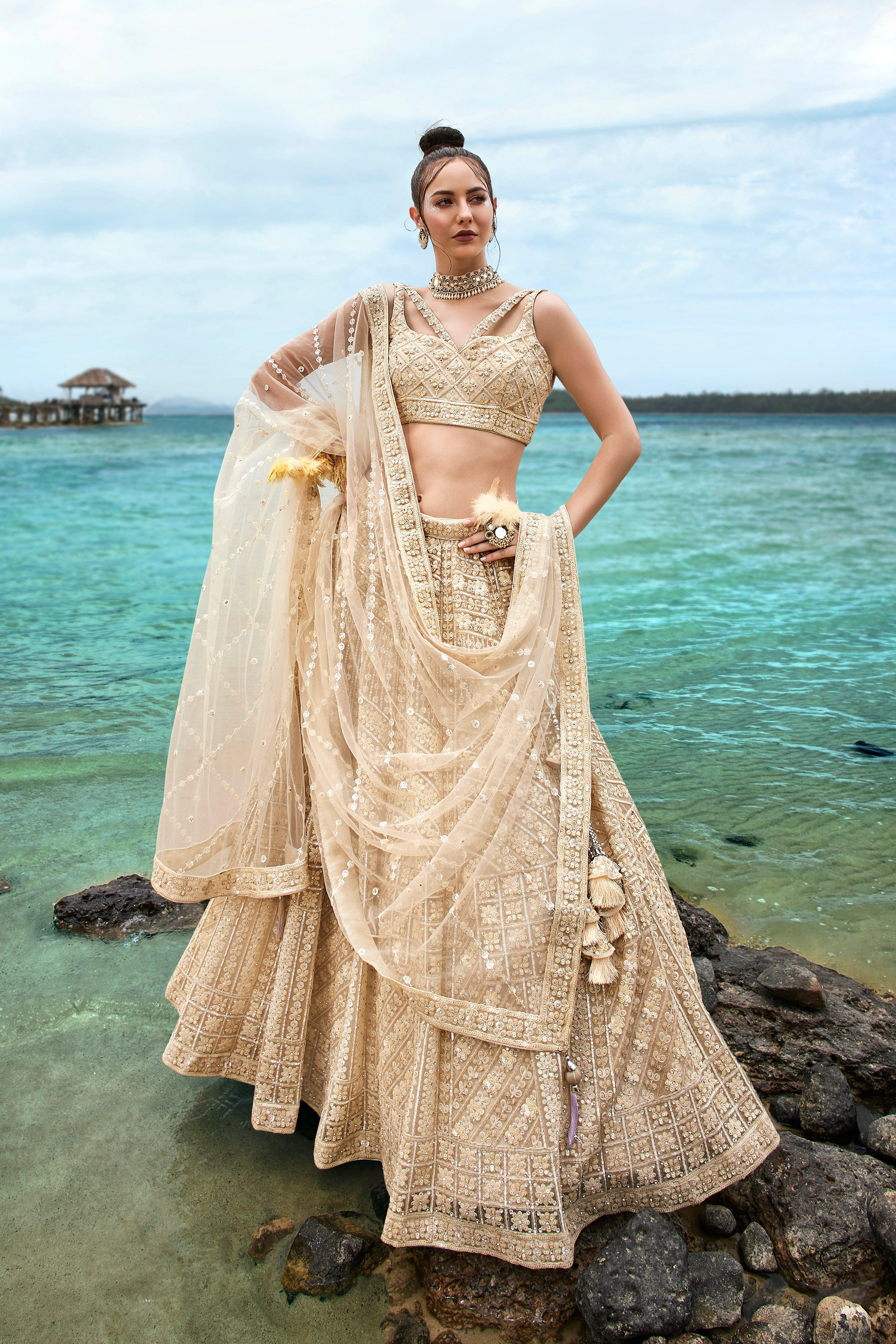House of Panchhi Cream Net Sequins, Zarkan And Thread Embroidery Lehenga Choli & Dupatta