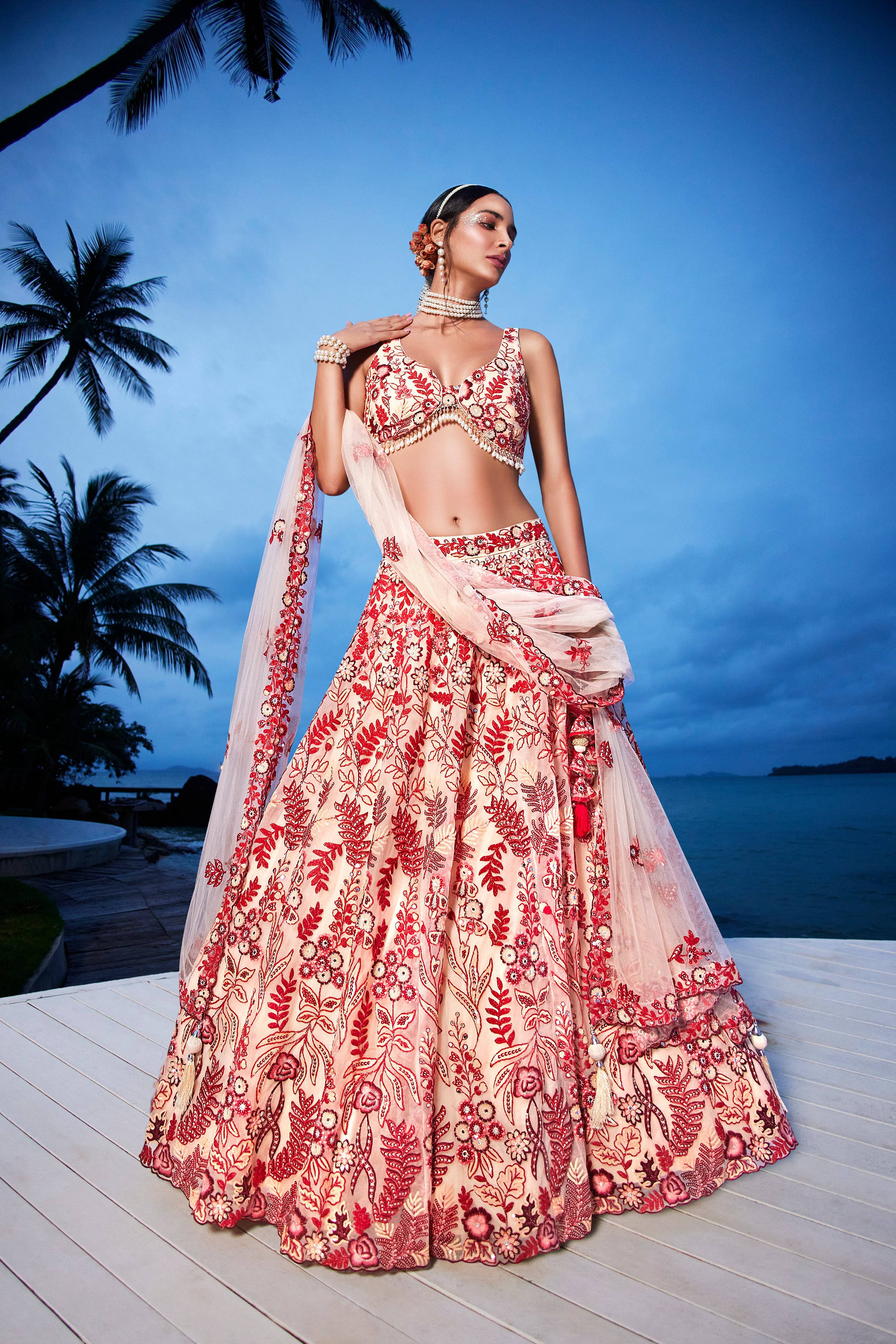 House of Panchhi Peach Net Sequins, Mirror And Thread Embroidery Lehenga Choli & Dupatta