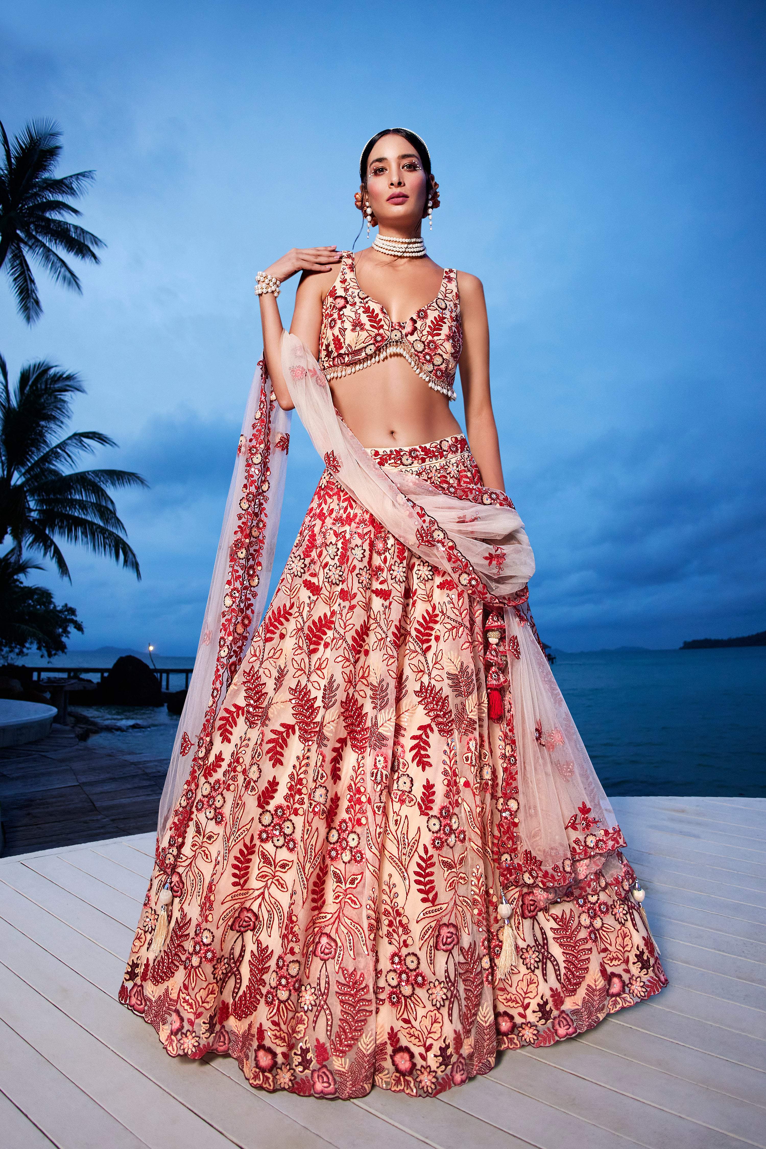 House of Panchhi Peach Net Sequins, Mirror And Thread Embroidery Lehenga Choli & Dupatta