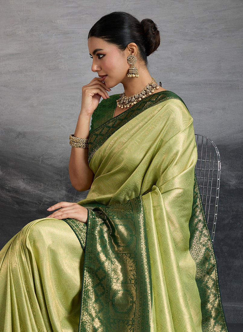 Monjolika Fashion Parrot Green Soft Kanjivaram Silk Meenakari Weaving Work Ceremonial Saree