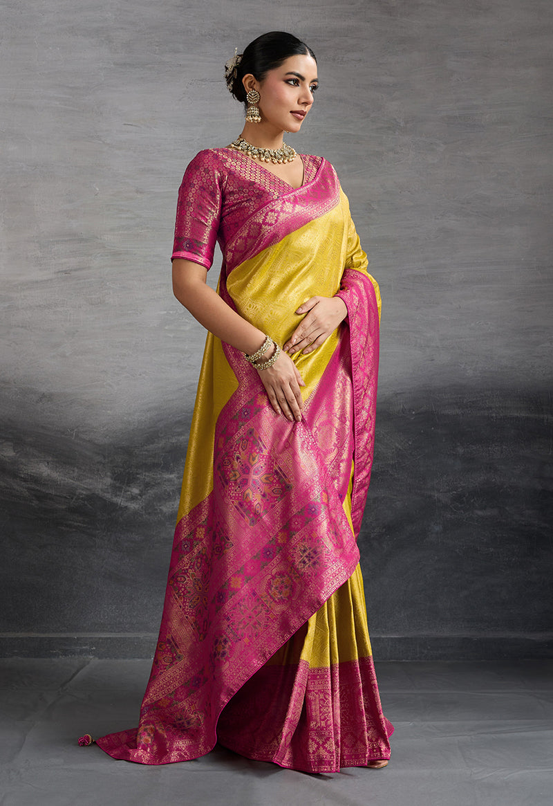 Monjolika Fashion Yellow Soft Kanjivaram Silk Meenakari Weaving Work Ceremonial Saree
