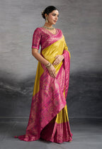 Monjolika Fashion Yellow Soft Kanjivaram Silk Meenakari Weaving Work Ceremonial Saree