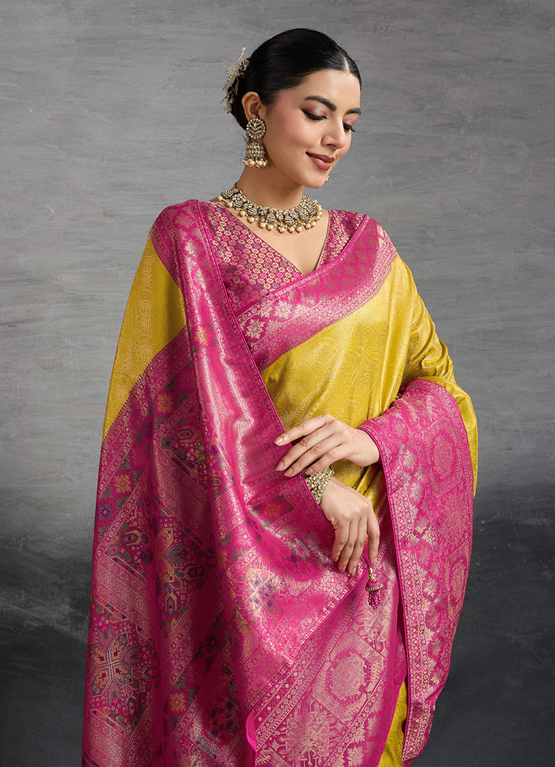 Monjolika Fashion Yellow Soft Kanjivaram Silk Meenakari Weaving Work Ceremonial Saree