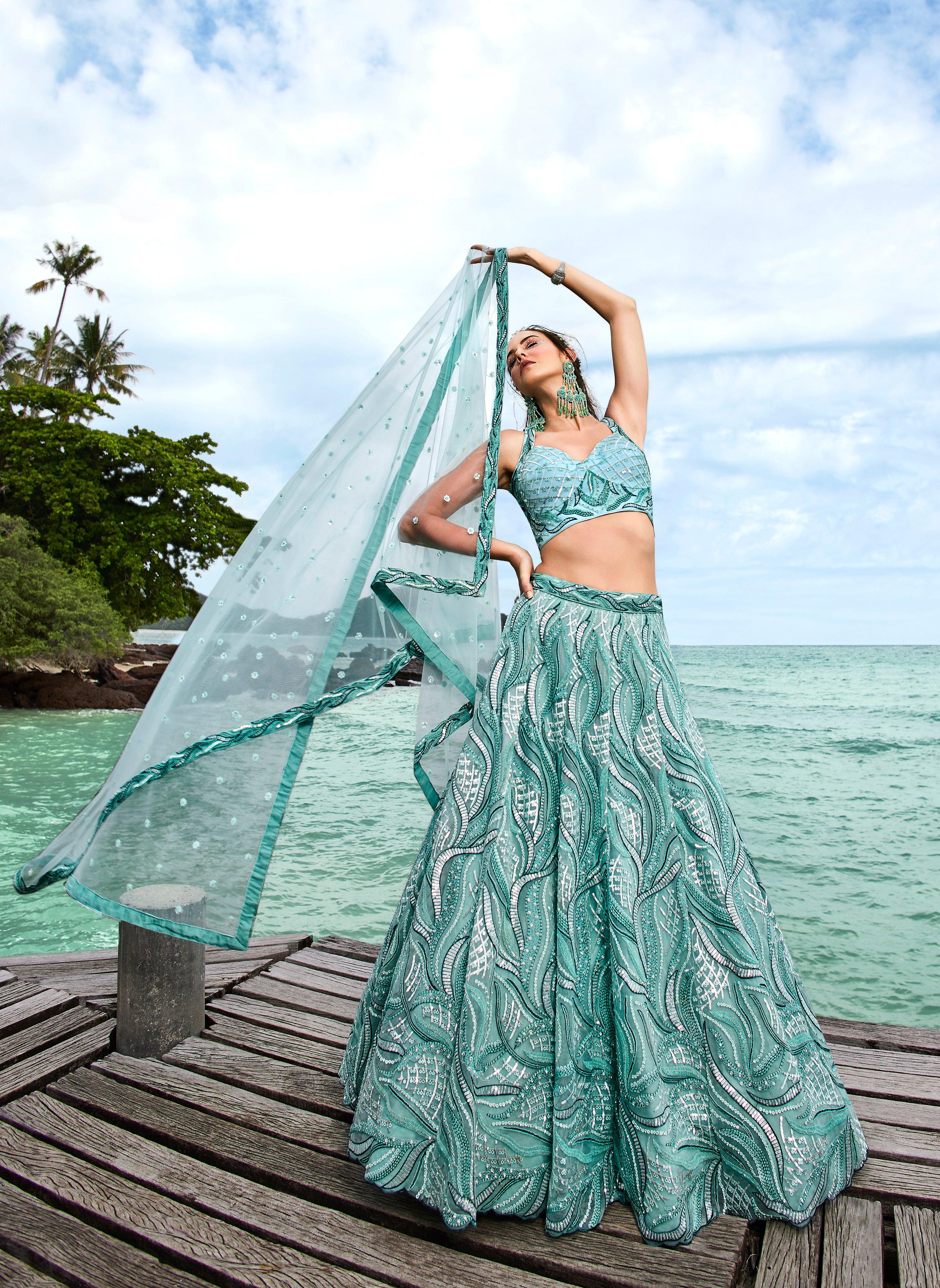 House of Panchhi Turquoise Blue Net Sequins, Zarkan And Thread Embroidery Lehenga Choli & Dupatta