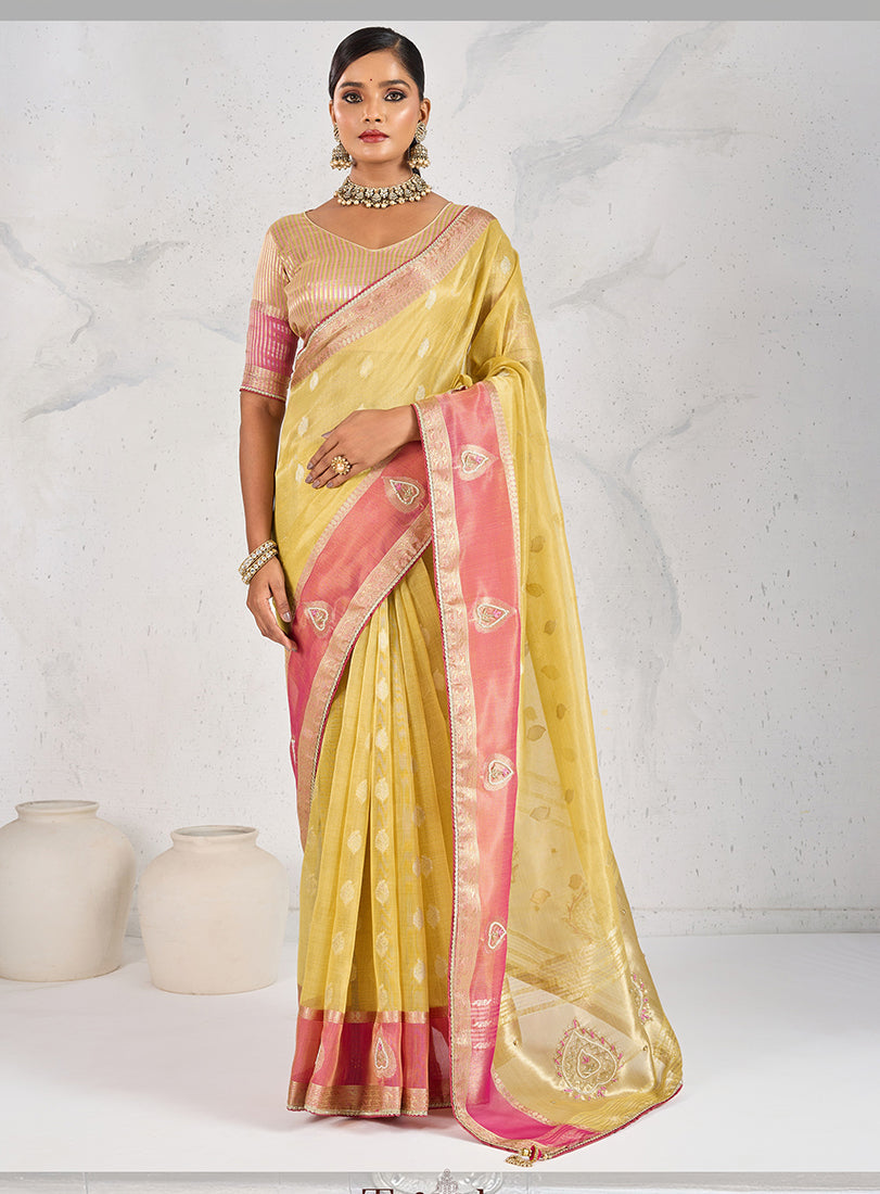 Monjolika Fashion Charming Yellow Soft Tissue Linen Saree With Pretty Blouse Piece