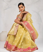 Monjolika Fashion Charming Yellow Soft Tissue Linen Saree With Pretty Blouse Piece