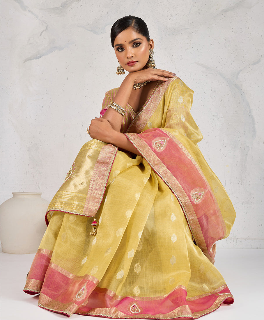 Monjolika Fashion Charming Yellow Soft Tissue Linen Saree With Pretty Blouse Piece