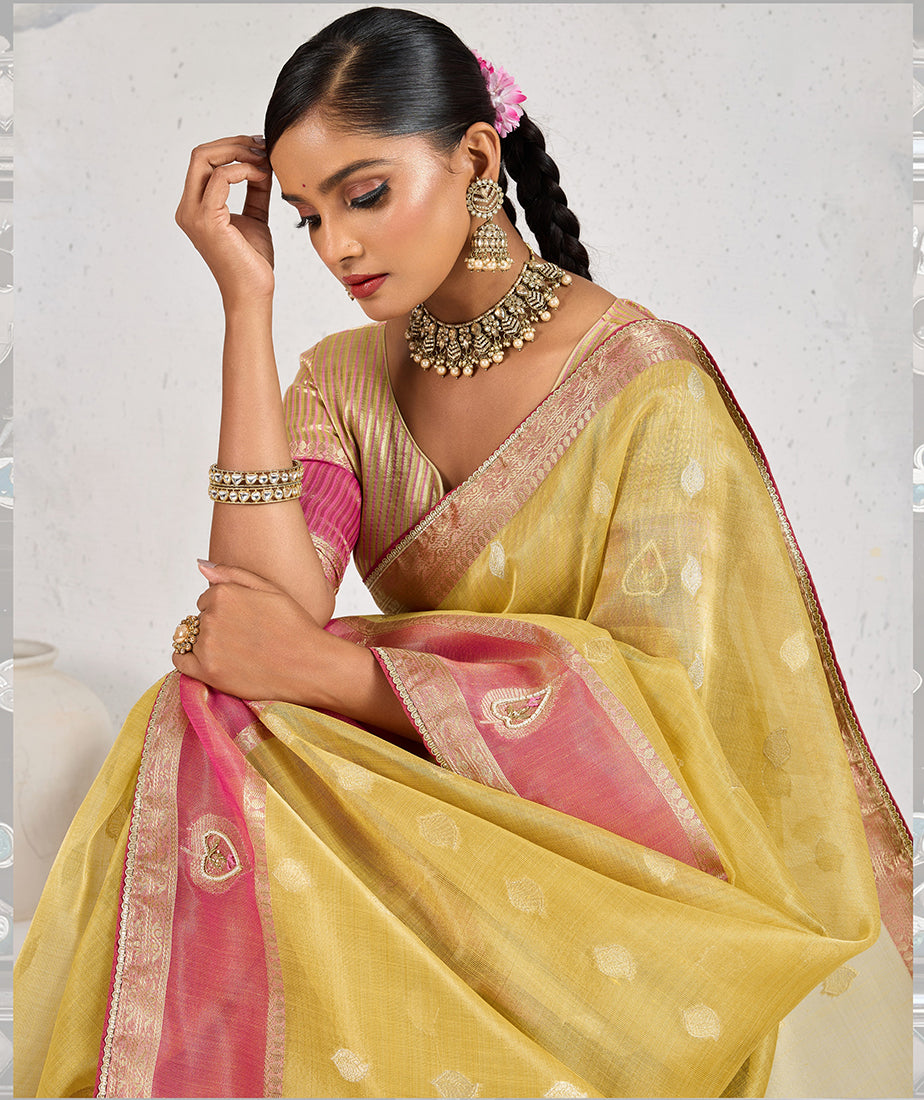 Monjolika Fashion Charming Yellow Soft Tissue Linen Saree With Pretty Blouse Piece