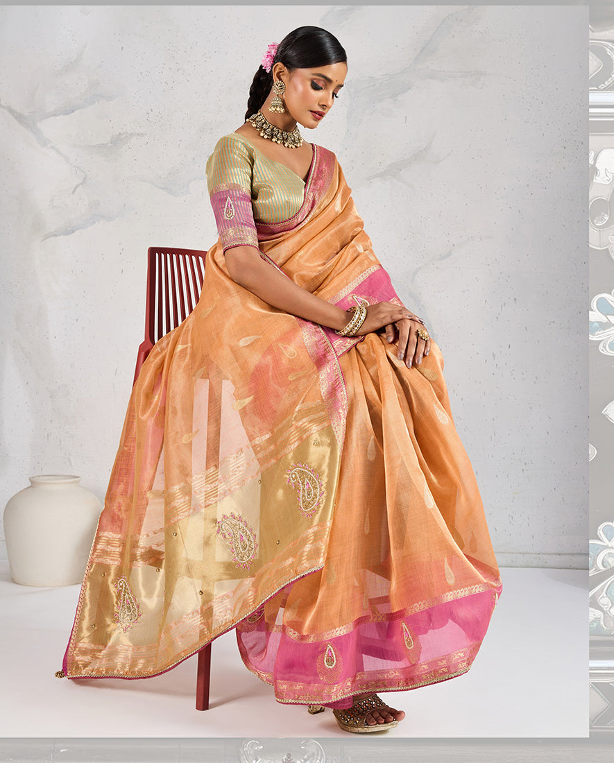 Monjolika Fashion Charming Light Orange Soft Tissue Linen Saree With Pretty Blouse Piece