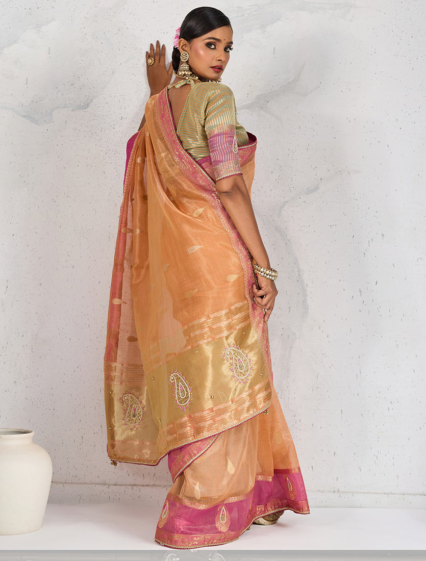 Monjolika Fashion Charming Light Orange Soft Tissue Linen Saree With Pretty Blouse Piece