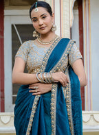 Monjolika Fashion Divine Teal Blue Satin Velvet Saree With Bewitching Blouse Piece