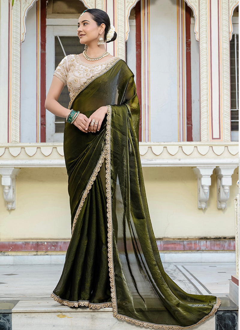 Monjolika Fashion Divine Mehendi Green Satin Velvet Saree With Bewitching Blouse Piece