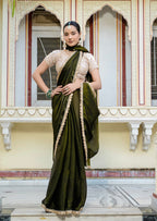 Monjolika Fashion Divine Mehendi Green Satin Velvet Saree With Bewitching Blouse Piece