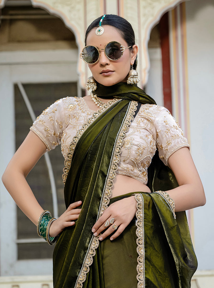 Monjolika Fashion Divine Mehendi Green Satin Velvet Saree With Bewitching Blouse Piece