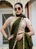 Monjolika Fashion Divine Mehendi Green Satin Velvet Saree With Bewitching Blouse Piece