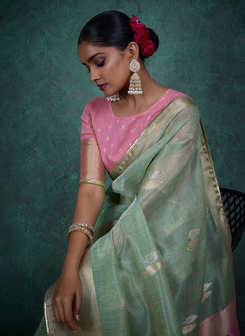 Monjolika Fashion A Glam Light Blue Linen Blend Woven Sequin Work Saree