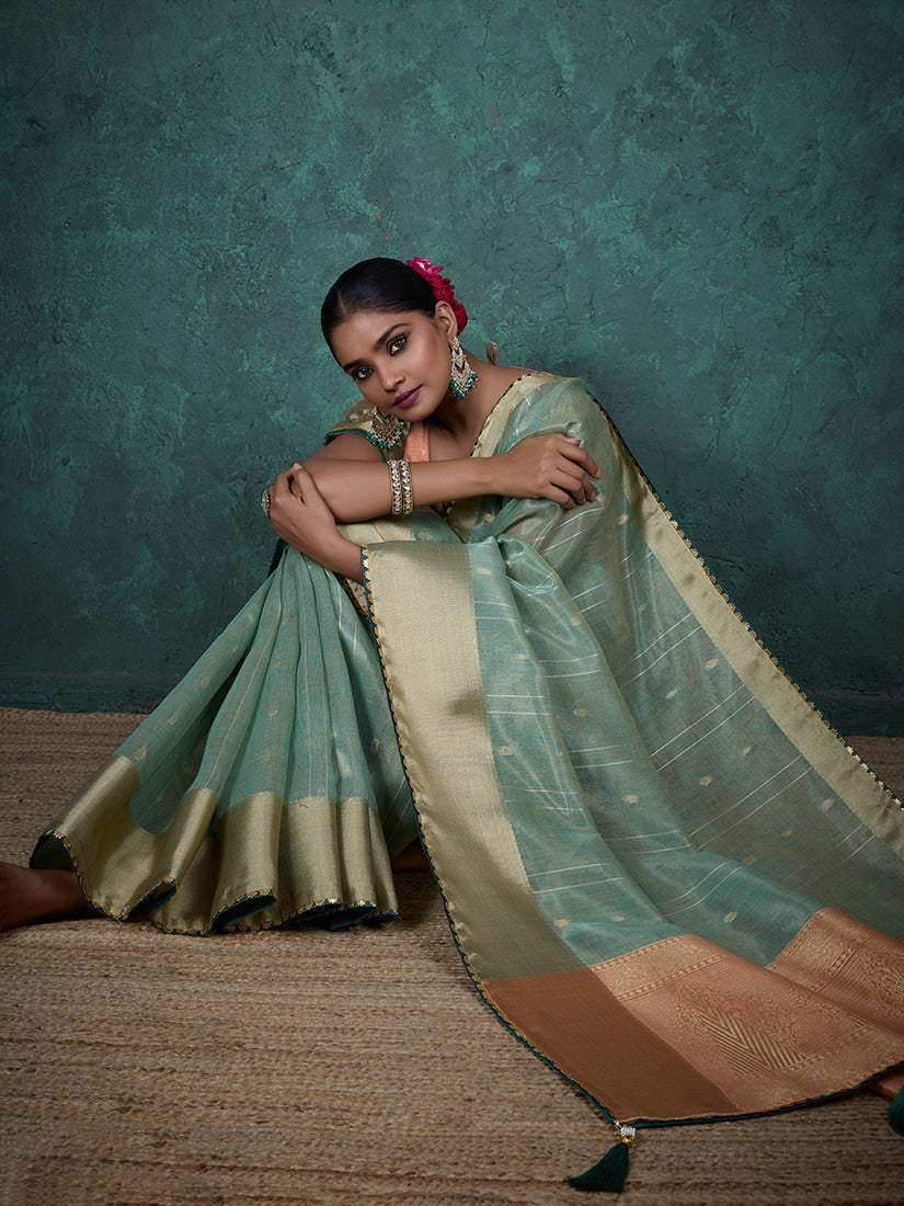 Monjolika Fashion A Glam Sky Blue Linen Blend Woven Sequin Work Saree