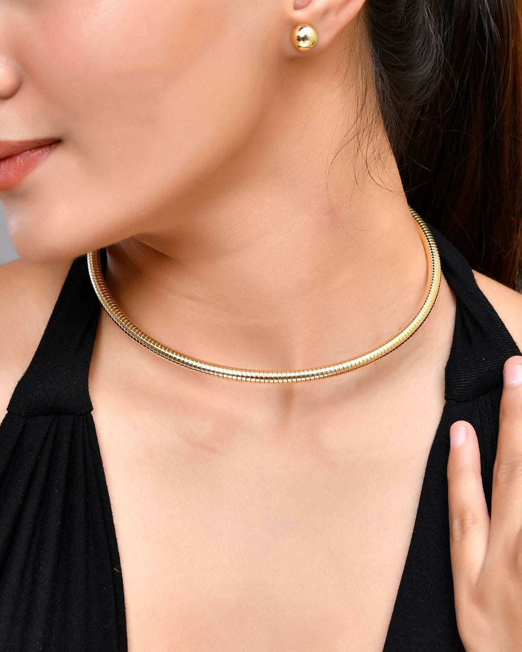 VOJ Gold-Polished Western Snake Hasli with Studs Earrings Set