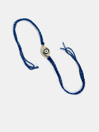 NVR Women & Men Set of 2 Blue Evil Eye Bhaiya Bhabhi Rakhi Set With Roli Chawal & Chocolate - Distacart