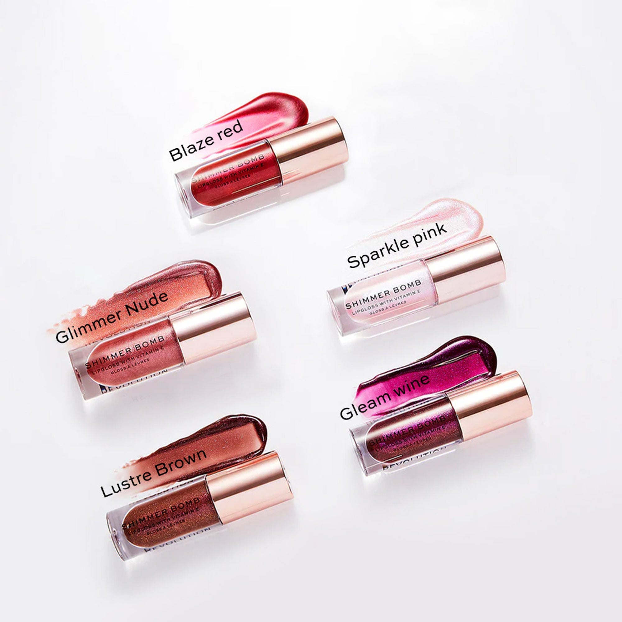 Makeup Revolution Shimmer Bomb Lipgloss-Infused With Vitamin E For Extra Nourishment - Sparkle Pink