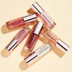 Makeup Revolution Shimmer Bomb Lipgloss-Infused With Vitamin E For Extra Nourishment - Sparkle Pink
