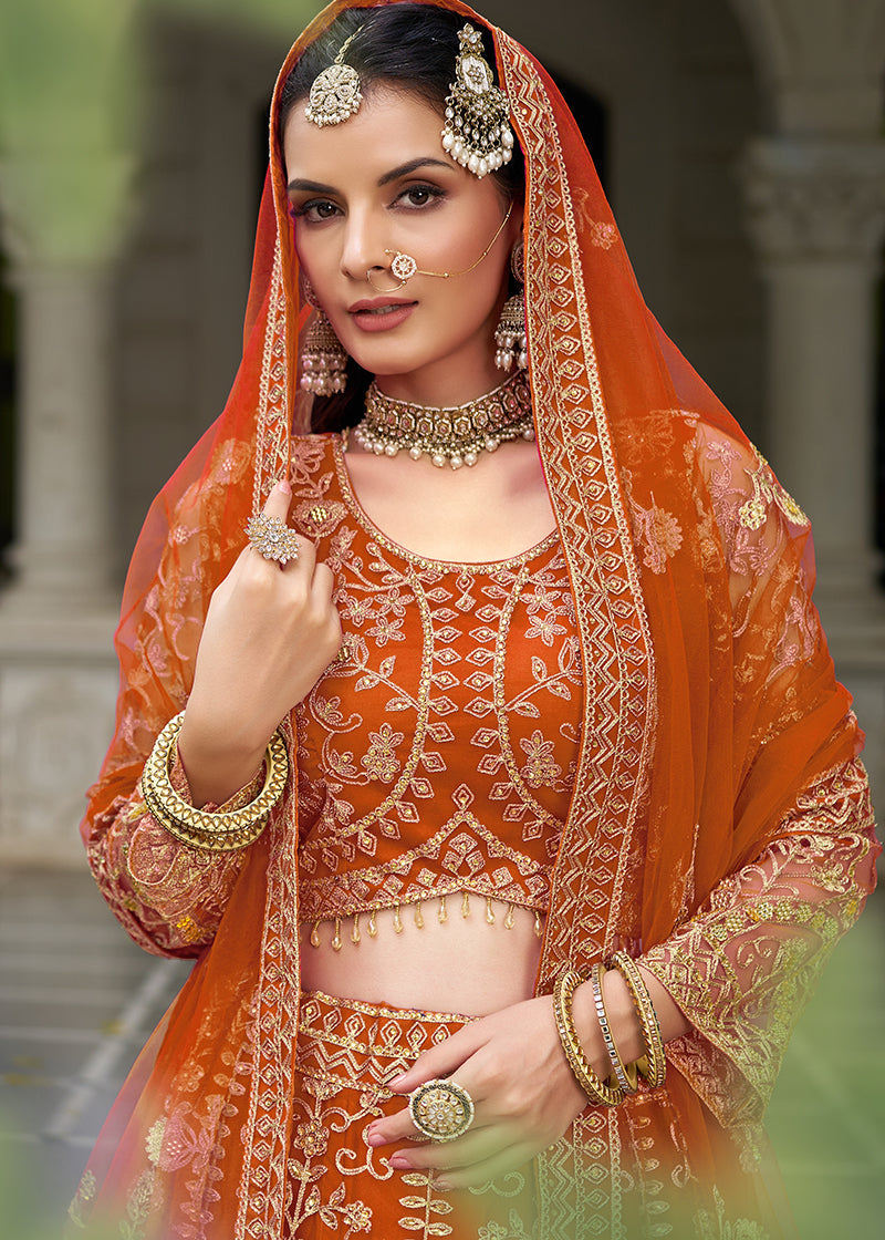 Monjolika Fashion Orange Butterfly Net Embroidered Work Stunning Lehenga For Wedding Season