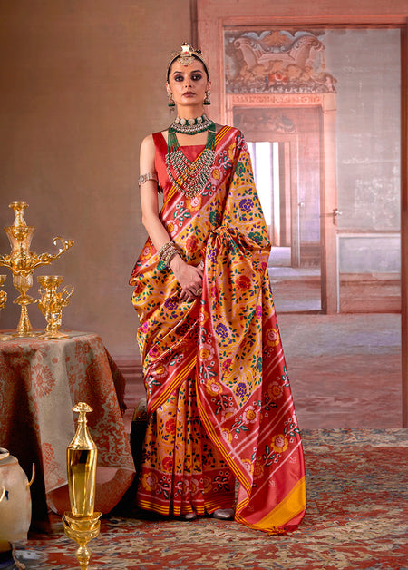 Monjolika Fashion Yellow Silk Blend Patola Print Saree with Red Blouse