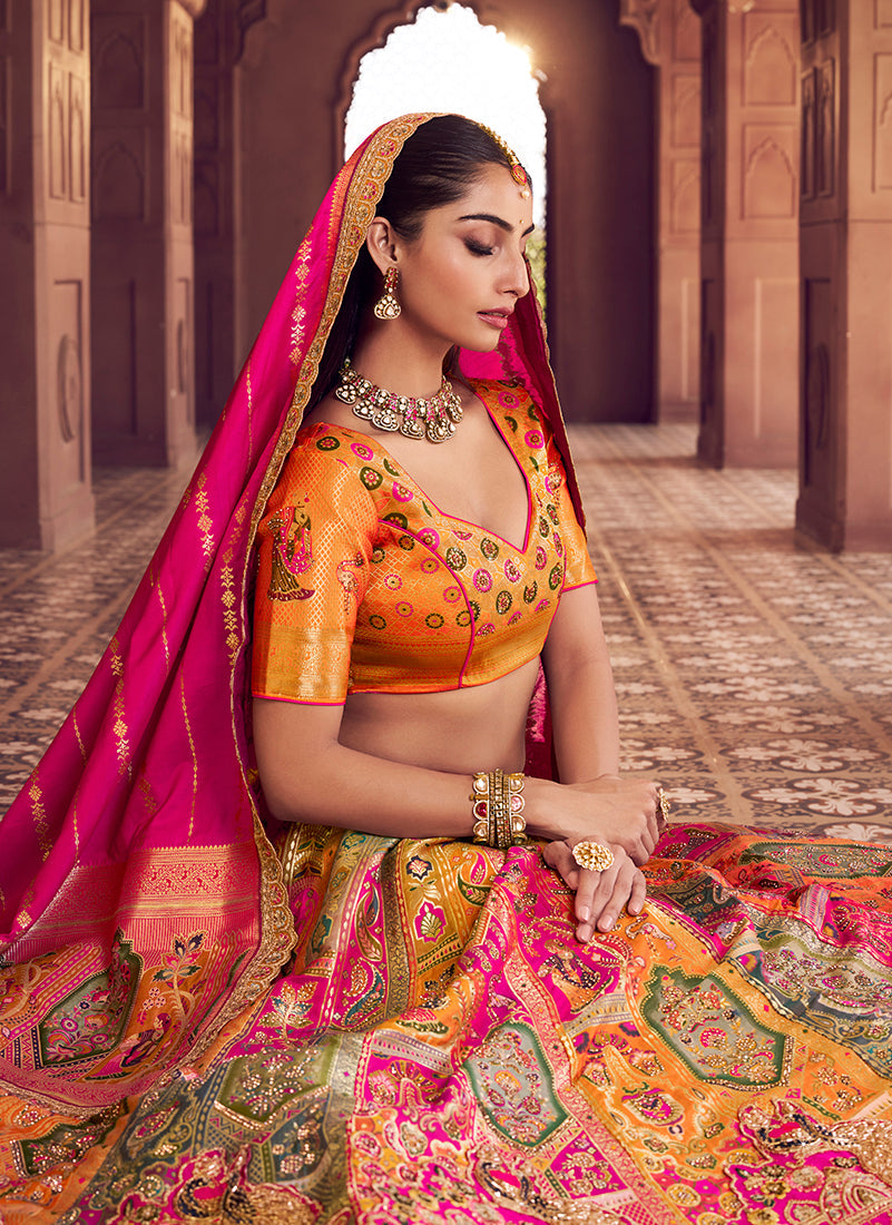 Monjolika Fashion Multi Colour Banarasi Silk Blend Embroidered, Sequins, Swarovski and Weaving Work Lehenga Choli