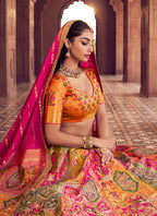 Monjolika Fashion Multi Colour Banarasi Silk Blend Embroidered, Sequins, Swarovski and Weaving Work Lehenga Choli