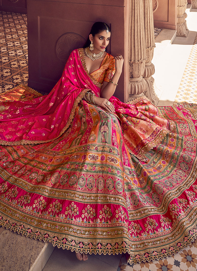 Monjolika Fashion Multi Colour Banarasi Silk Blend Embroidered, Sequins, Swarovski and Weaving Work Lehenga Choli