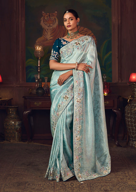 Monjolika Fashion Sky Blue Zari Woven Silk Blend Embroidered Saree For Wedding Wear