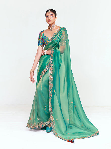 Monjolika Fashion Fancy Fabric Embroidered Sea Green Saree