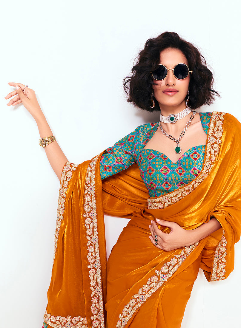 Monjolika Fashion Fancy Fabric Embroidered Orange Saree