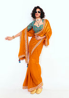 Monjolika Fashion Fancy Fabric Embroidered Orange Saree