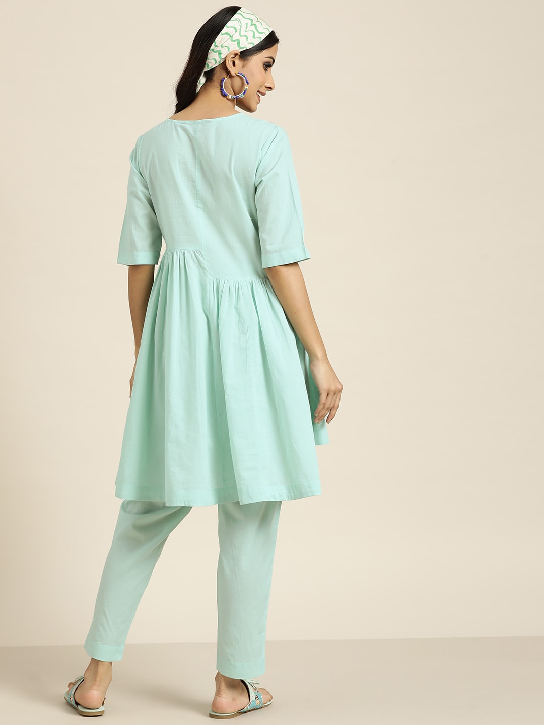 Sangria Women Turquoise Blue Floral Embroidered Kurta with Palazzos