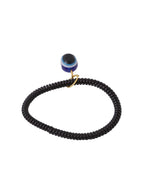 NVR Women & Men Black Evil Eye Spring Ring Rakhi With Roli Chawal - Distacart