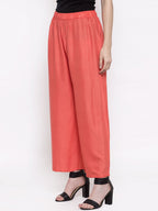 TAG 7 Women Peach-Coloured Solid Flared Palazzos