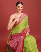 Monjolika Fashion Exquisite Designs With This Regal Parrot Green Patola Pallu Banarasi Tissue Silk Saree