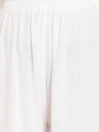 TAG 7 Women White Solid Flared Palazzos