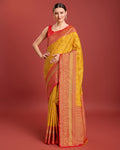 Monjolika Fashion Glamour And Tradition With This Mustard Color Zari Woven Banarasi Tissue Silk Saree