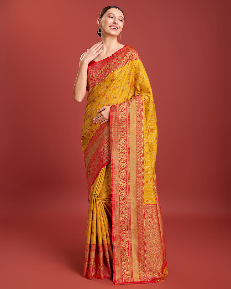 Monjolika Fashion Glamour And Tradition With This Mustard Color Zari Woven Banarasi Tissue Silk Saree