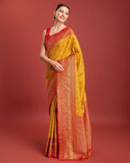 Monjolika Fashion Glamour And Tradition With This Mustard Color Zari Woven Banarasi Tissue Silk Saree