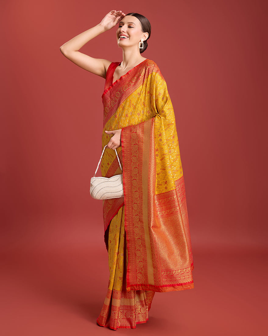 Monjolika Fashion Glamour And Tradition With This Mustard Color Zari Woven Banarasi Tissue Silk Saree