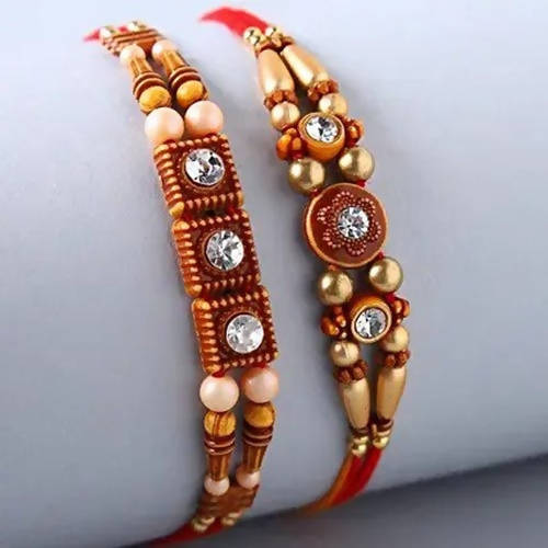 2 Stone Work Rakhis and Choco Swiss Jingles Box - Distacart